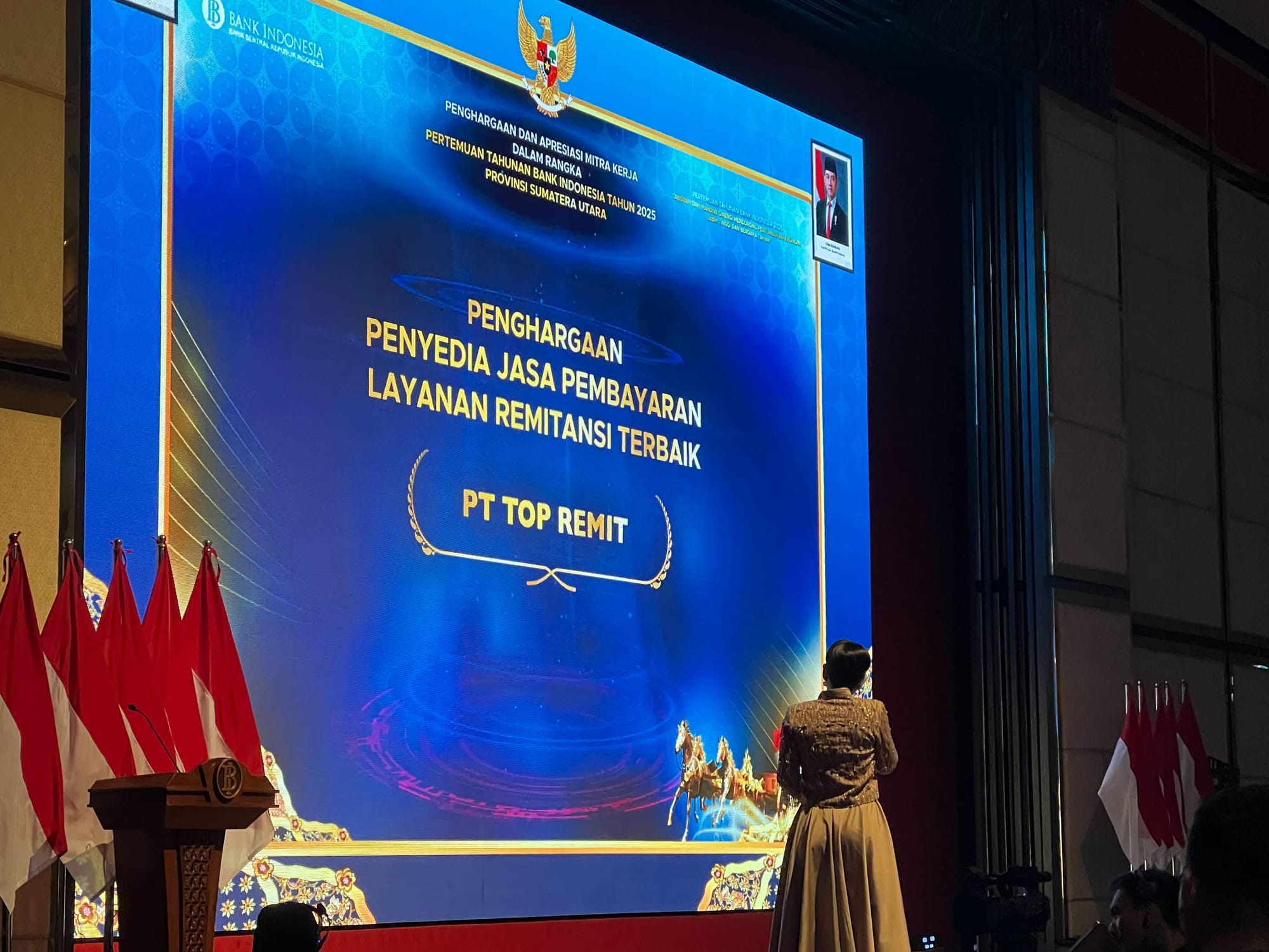 Bank Indonesia screen displaying the Best Remittance Service Provider award for PT Top Remit.