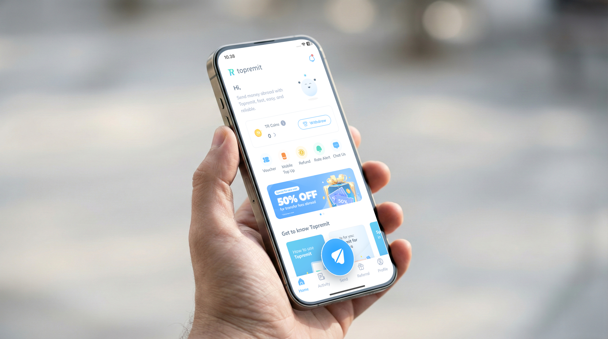 People holding a phone displaying the Topremit app, the best international money transfer solution for expats in Indonesia