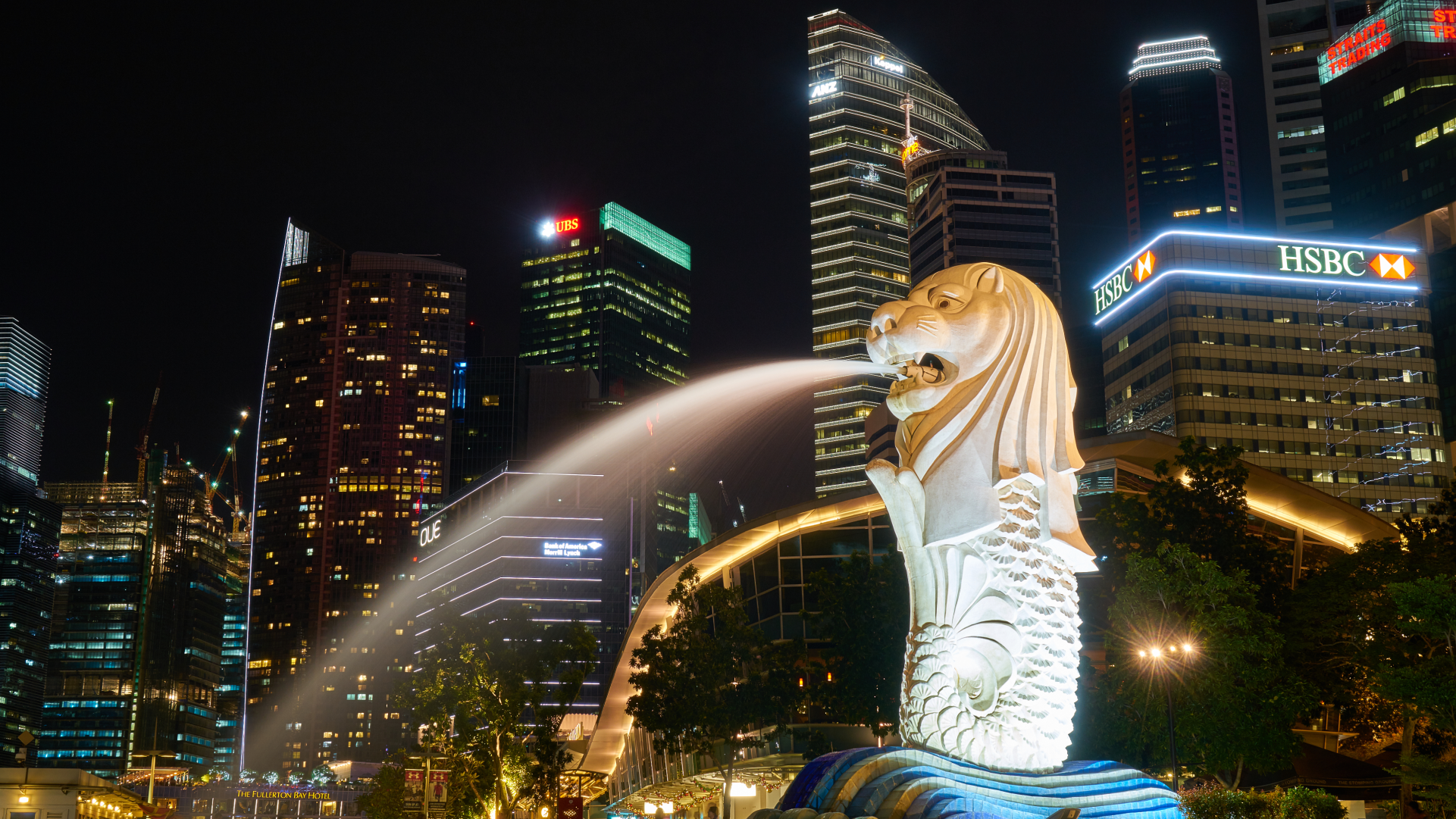 Merlion dengan gedung-gedung Singapura sebagai salah satu negara pemasok impor terbesar Indonesia