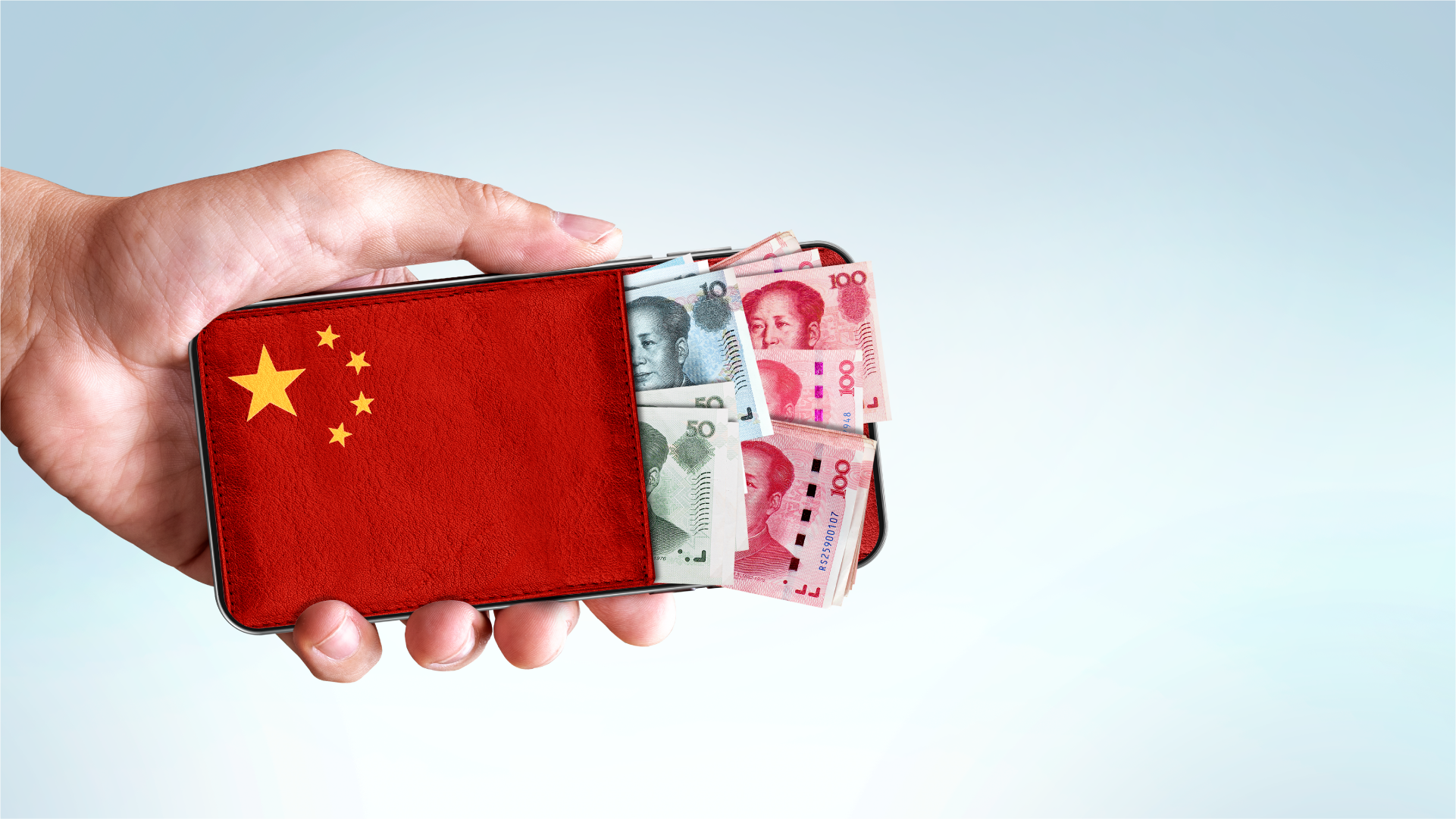 Uang Yuan dalam HP dengan gambar menyerupai dompet bendera China untuk ilustrasi pembayaran supplier di China dalam Yuan.