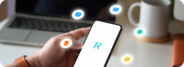 Aplikasi Topremit di smartphone dengan berbagai ikon fitur yang membantu proses transfer uang ke luar negeri